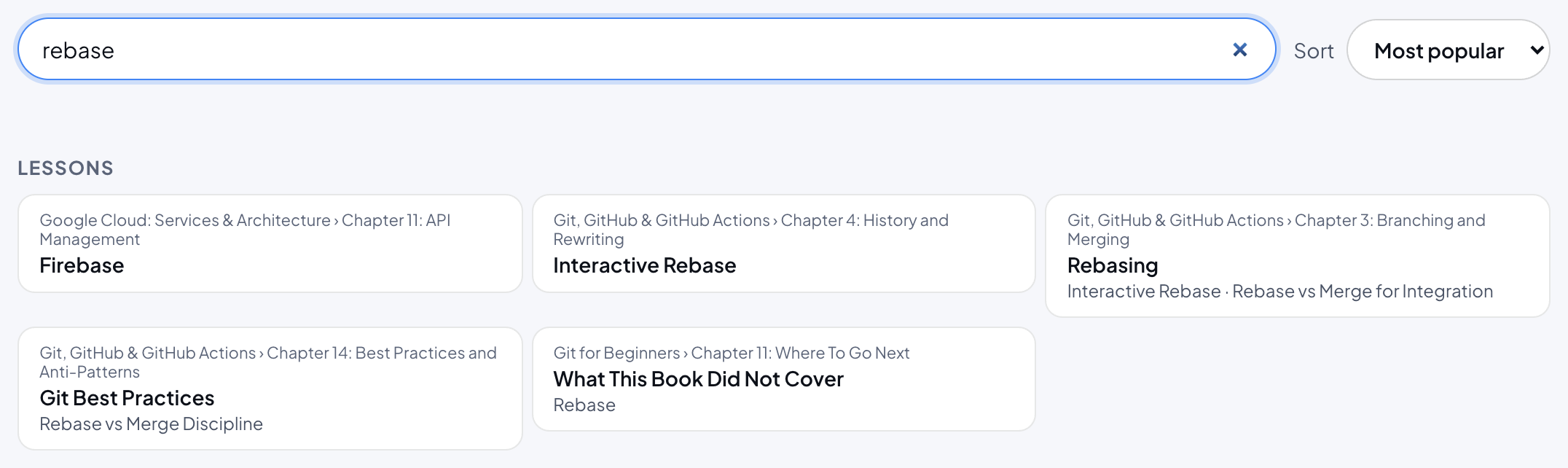 Searching for rebase: no course card matches, and a Lessons list shows five matching lessons, each with its course and chapter and, where a section matched, the section names.